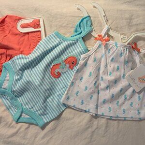 Set of three clothing size newborn. Brand new with tags.